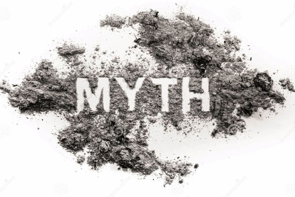 Grey dust in a pile that has 'myth' stencilled into it